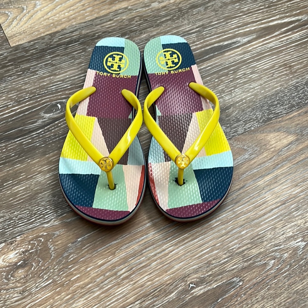 Size 7.5 Tori Burch flip flops. Super cute.